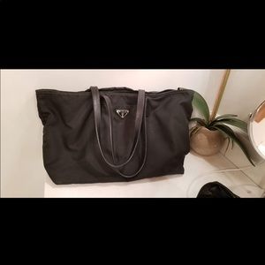 Black Prada bag with full zipper . Good used condition - perfect on the go bag